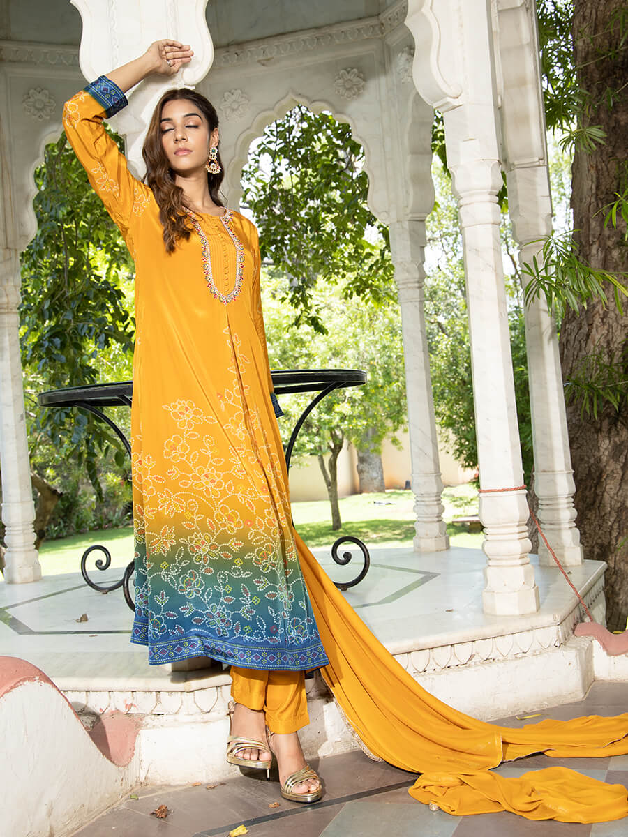 Women wearing Yellow Shaded Bandhani Kurta Set with Dupatta