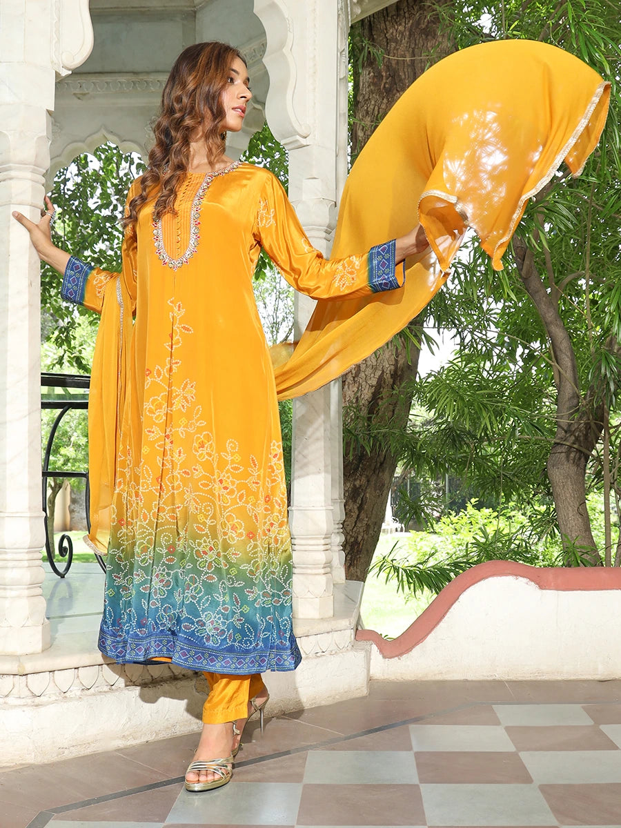 Women wearing Yellow Shaded Bandhani Kurta Set with Dupatta