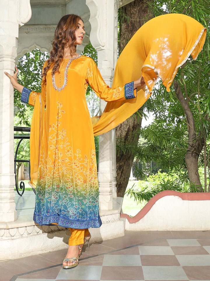 Women wearing Yellow Shaded Bandhani Kurta Set with Dupatta